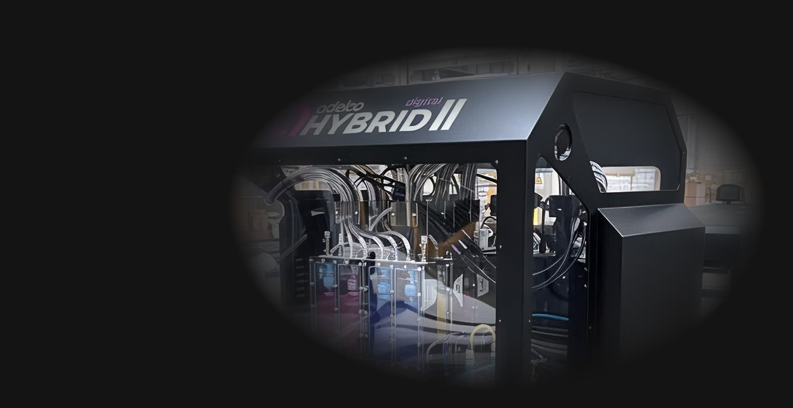Adelco Syntra inline hybrid system, screen and digital print stations on one line