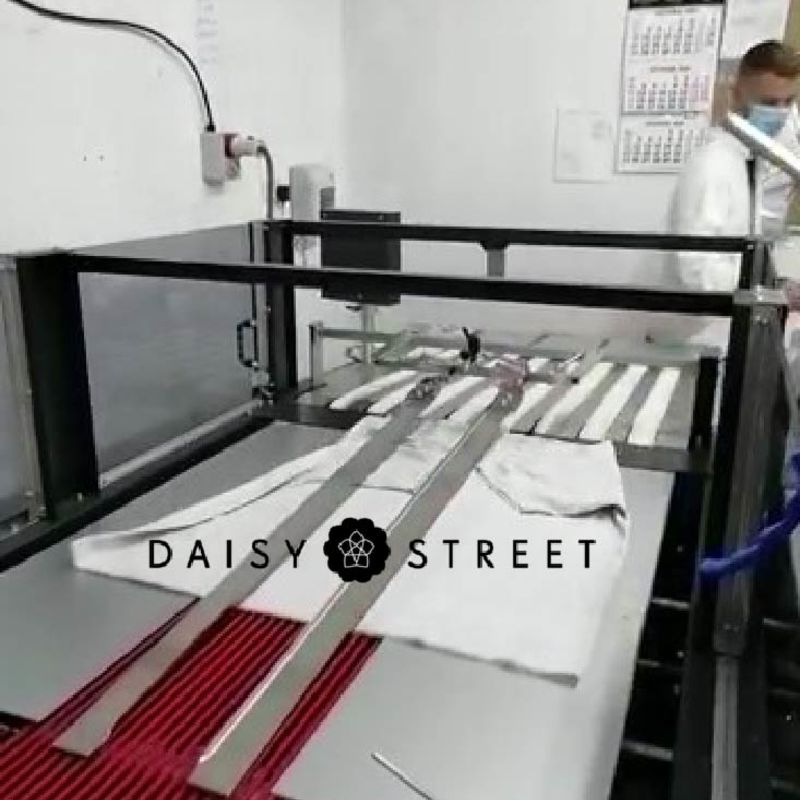 Daisy Street - Thermotron Folding and Bagging line